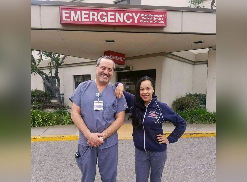 PHOTO: Rosario Salazar, an emergency room nurse poses for a photo with her husband, Stephen Kishineff, an ER doctor. Both have been working throughout the COVID-19 pandemic.