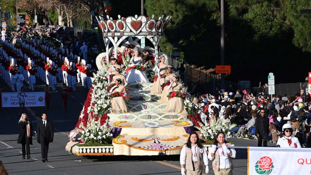 PHOTO: Rose Queen Camille Kennedy and members of her royal court wave from their float in the 131st Rose Parade in Pasadena, California, January 1, 2020.