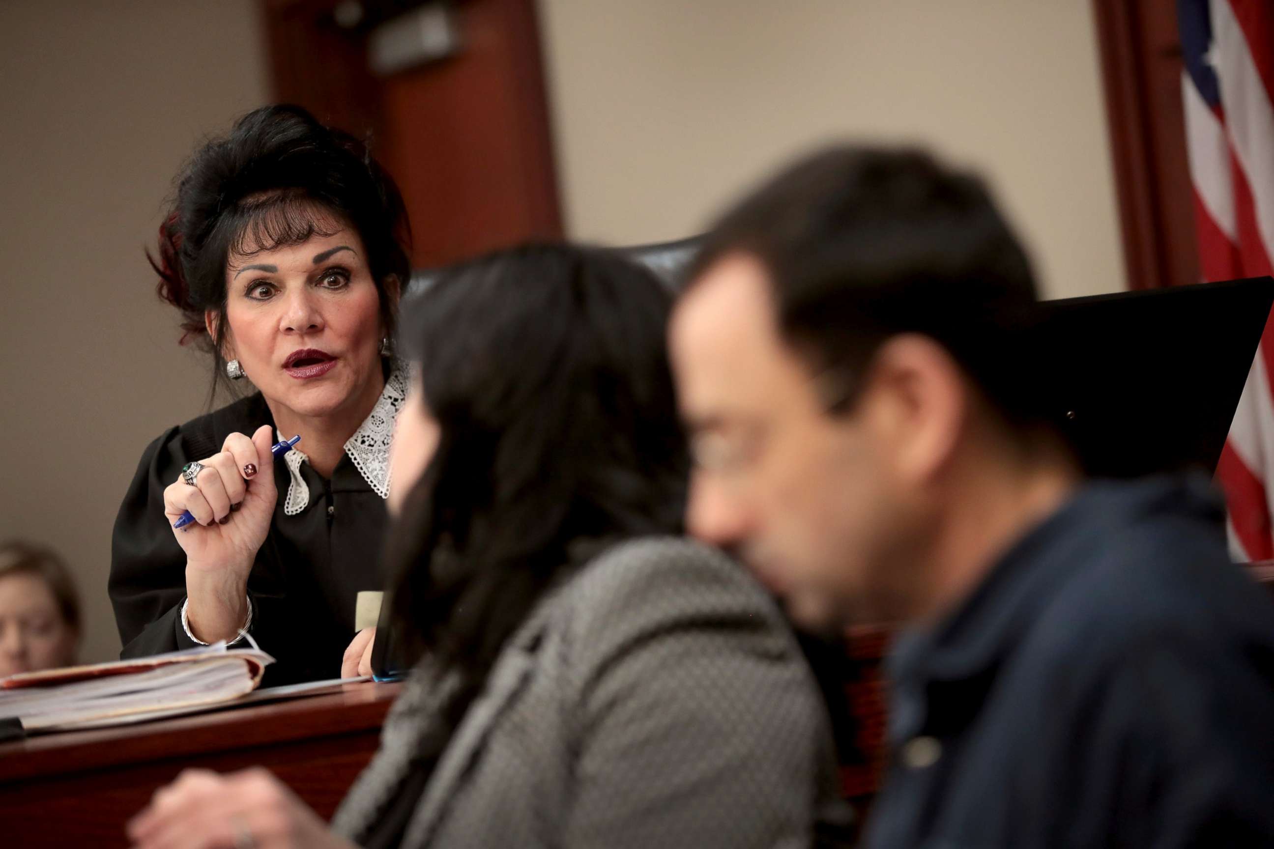 PHOTO: Judge Rosemarie Aquilina speaks with Larry Nassar, right, and his attorney Shannon Smith as he appears in court, Jan. 16, 2018, in Lansing, Mich.