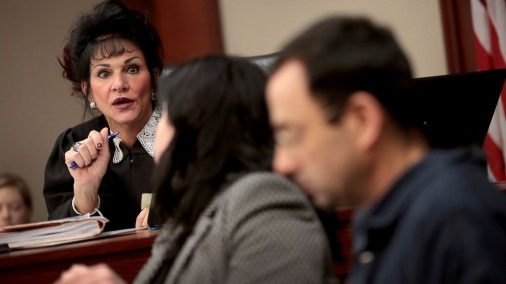 PHOTO: Judge Rosemarie Aquilina speaks with Larry Nassar, right, and his attorney Shannon Smith as he appears in court, Jan. 16, 2018, in Lansing, Mich.