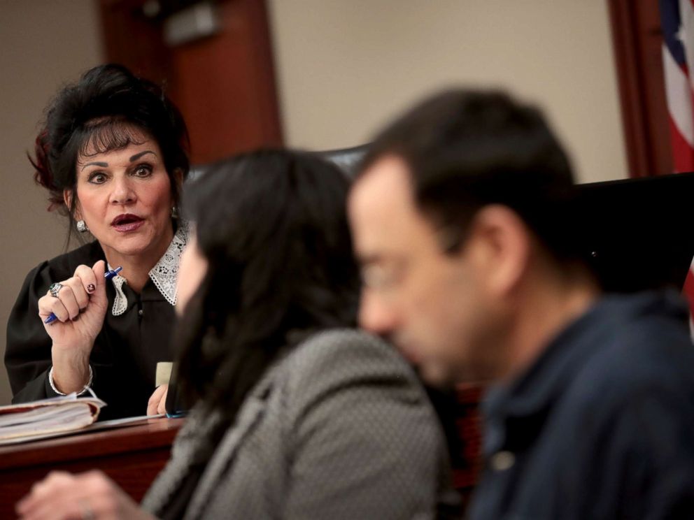 PHOTO: Judge Rosemarie Aquilina speaks with Larry Nassar, right, and his attorney Shannon Smith as he appears in court, Jan. 16, 2018, in Lansing, Mich.