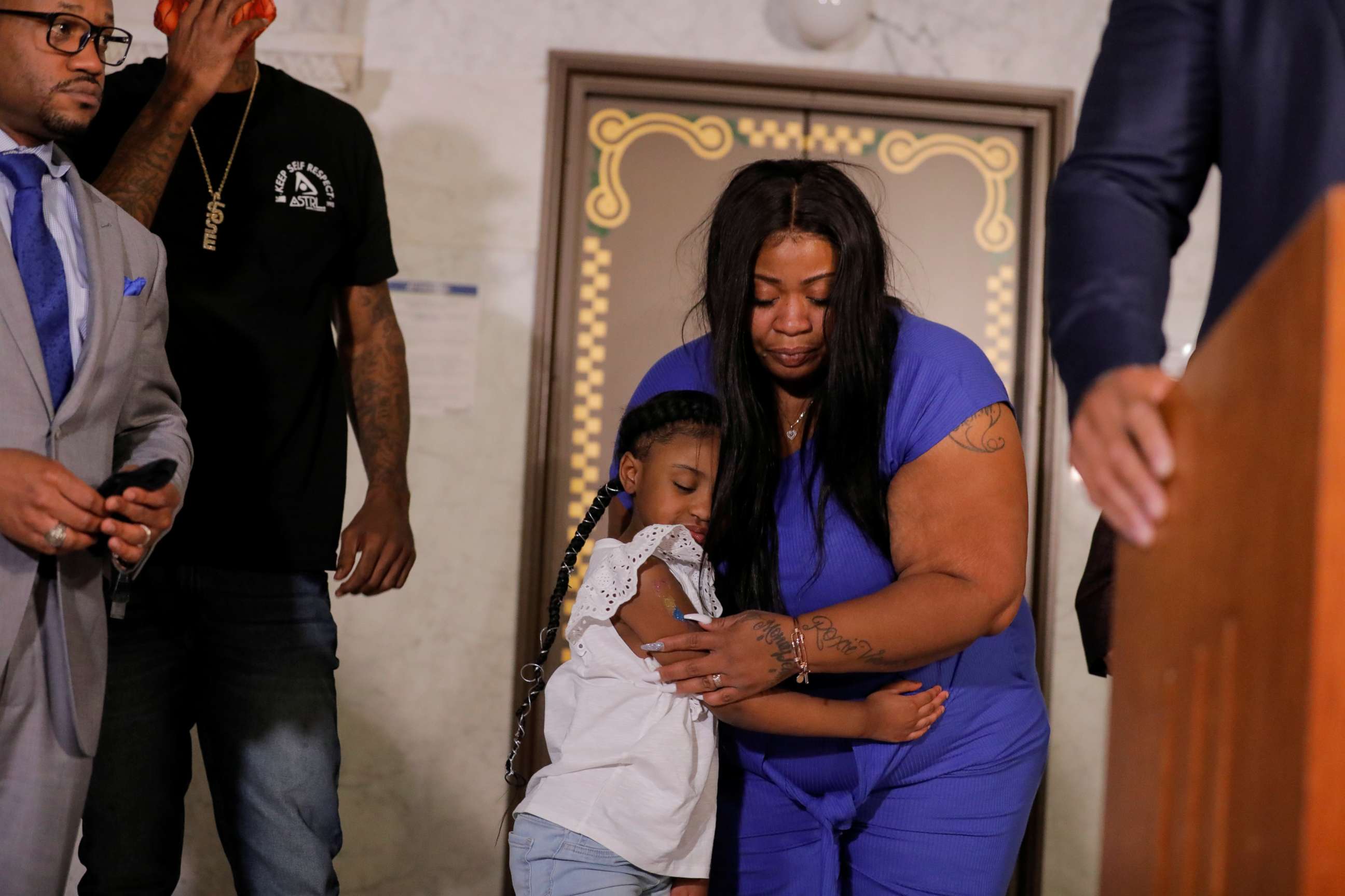 PHOTO: George Floyd's 6-year-old daughter, Gianna, embraces her mother, Roxie Washington, before speaking about her father, following his death in Minneapolis police custody, June 2, 2020.