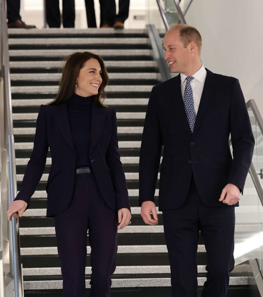 PHOTO: Kate Middleton, Princess of Wales and Prince William arrive at Boston's Logan International Airport on November 30, 2022.