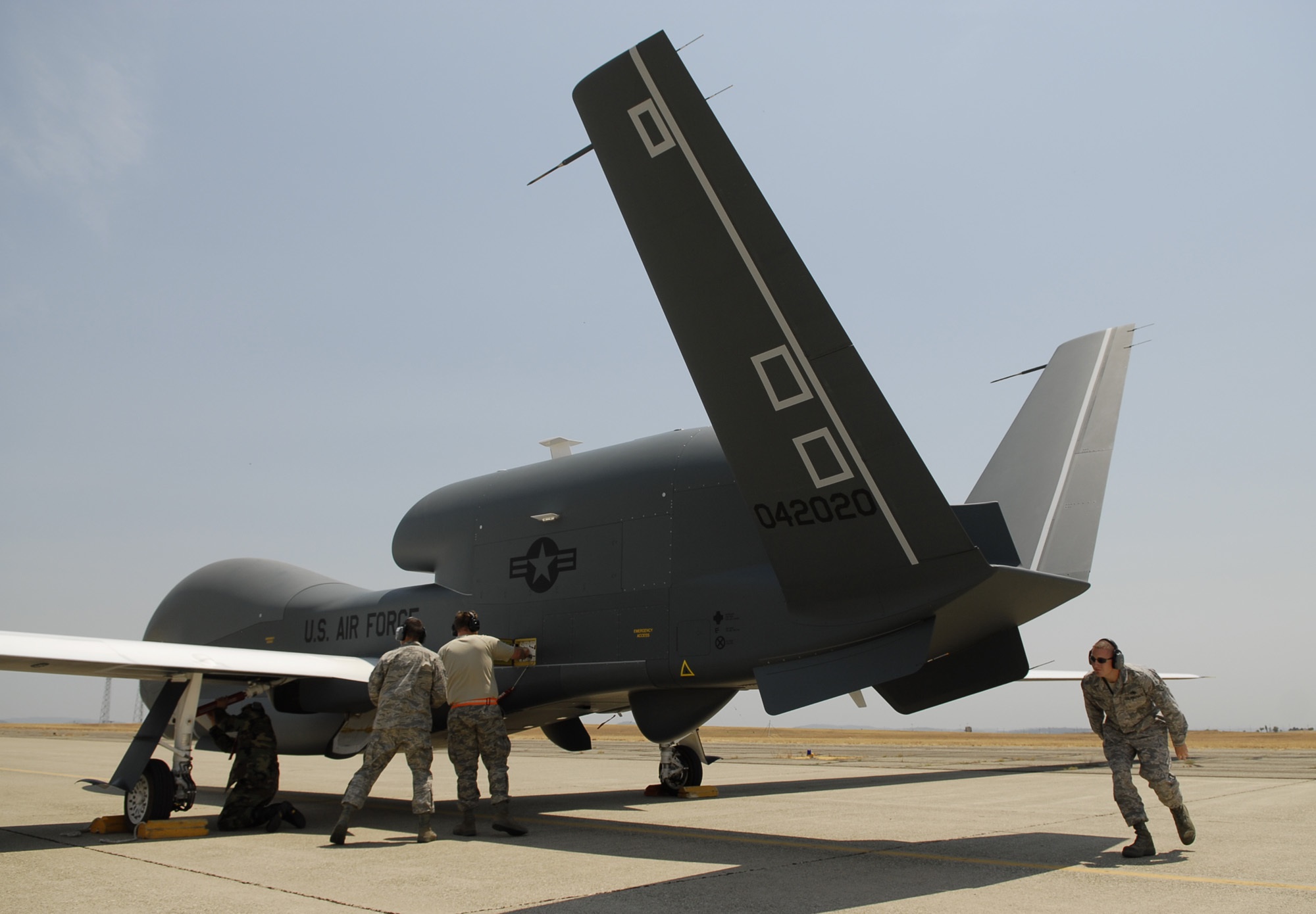 PHOTO: In a Monday, June 30, 2008, file photo, Beale Air Force Base Airmen work on an RQ-4 Global Hawk into its hangar at Beale Air Force Base in Yuba County, Calif. 