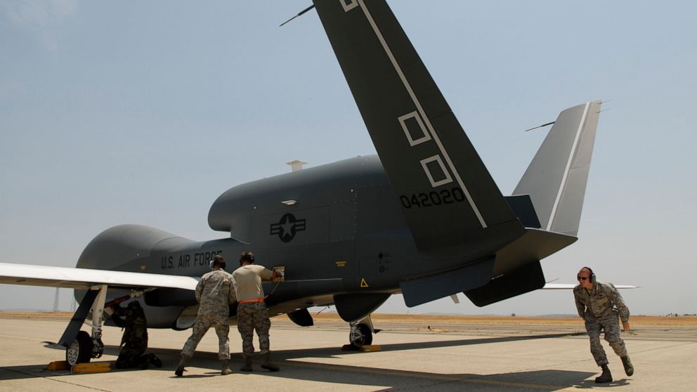 PHOTO: In a Monday, June 30, 2008, file photo, Beale Air Force Base Airmen work on an RQ-4 Global Hawk into its hangar at Beale Air Force Base in Yuba County, Calif. 