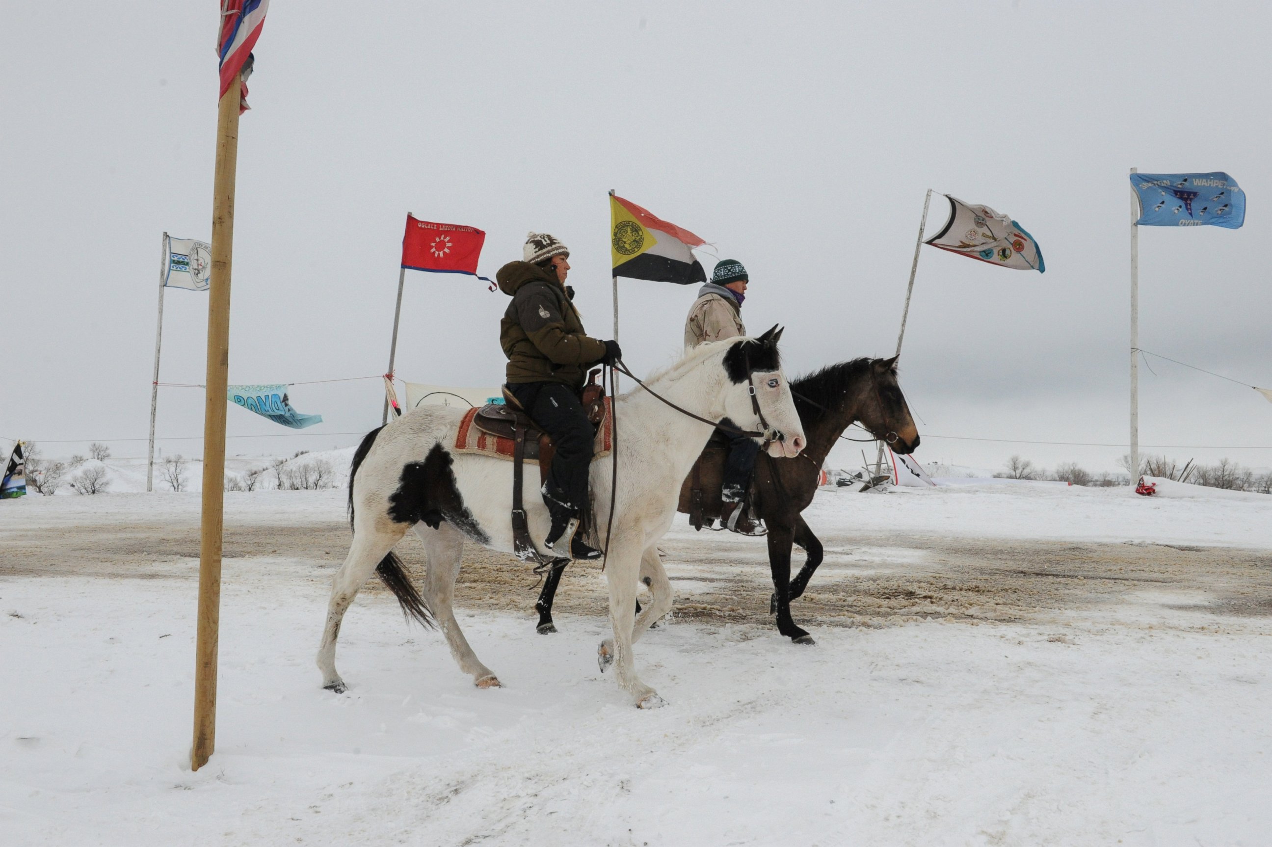 PHOTO: People ride horses in the Oceti Sakowin camp during a protest against plans to pass the Dakota Access pipeline near the Standing Rock Indian Reservation, near Cannon Ball, North Dakota, Nov. 30, 2016.