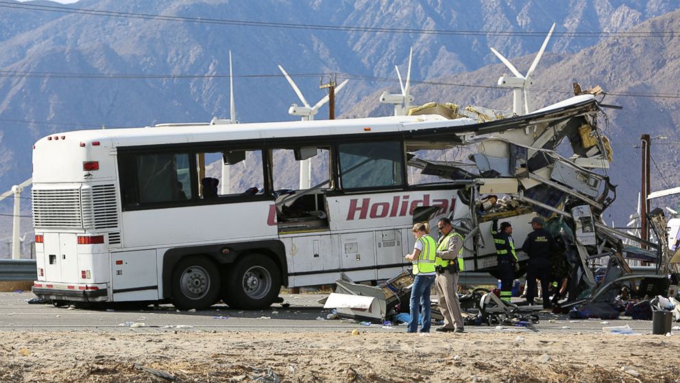 PHOTO: Investigators at the scene of a mass casualty bus crash on the westbound Interstate 10 freeway near Palm Springs, California, Oct. 23, 2016.  