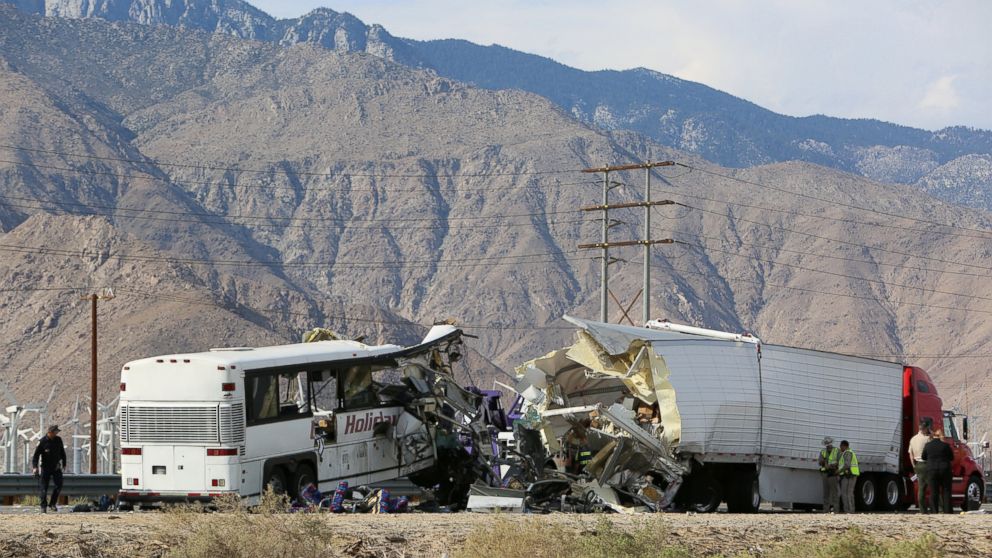 PHOTO: Investigators confer at the scene of a mass casualty bus crash on the westbound Interstate 10 freeway near Palm Springs, California, Oct. 23, 2016. 