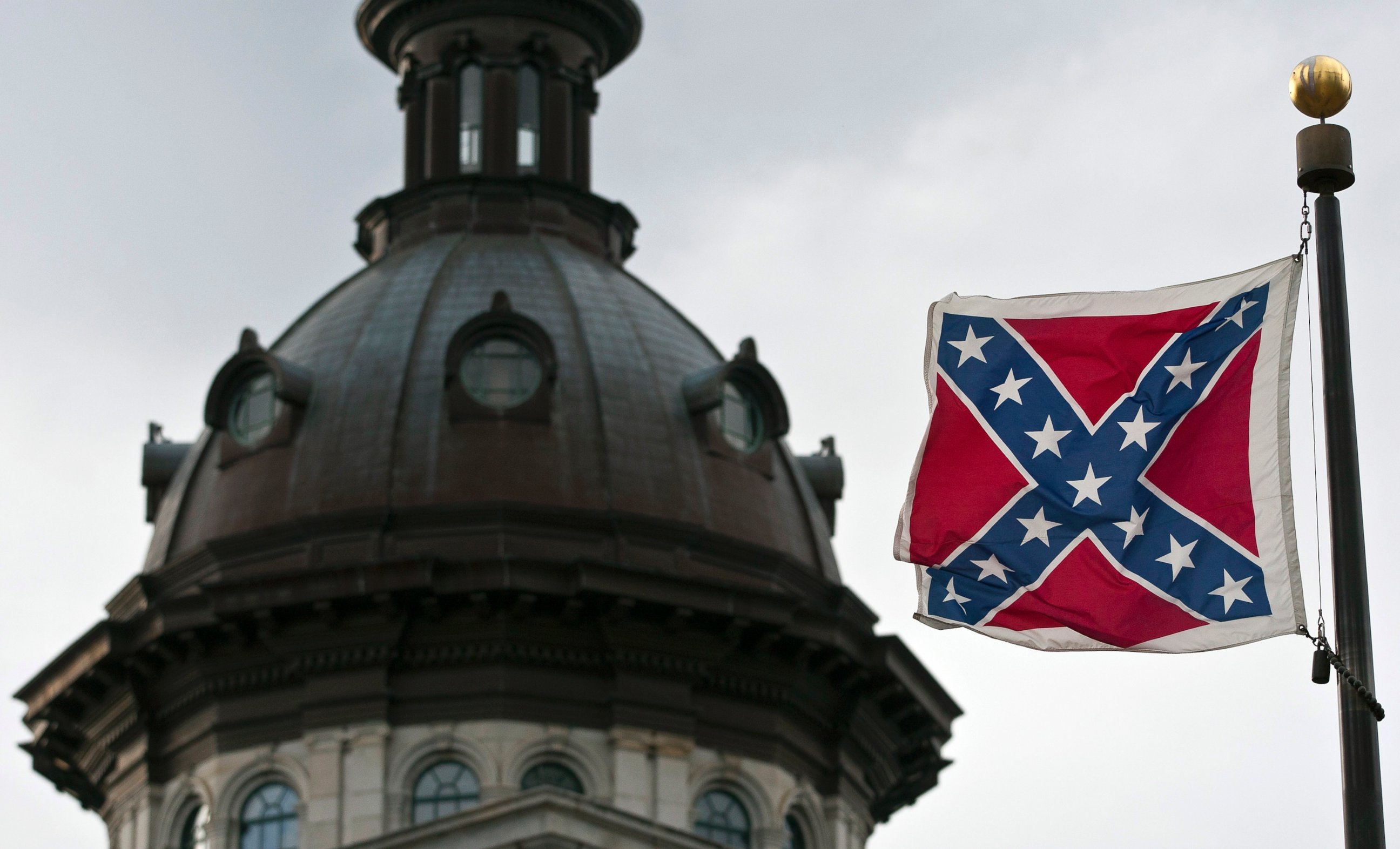 PHOTO: A Confederate flag flies outside the South Carolina State House in Columbia, South Carolina January 17, 2012. 