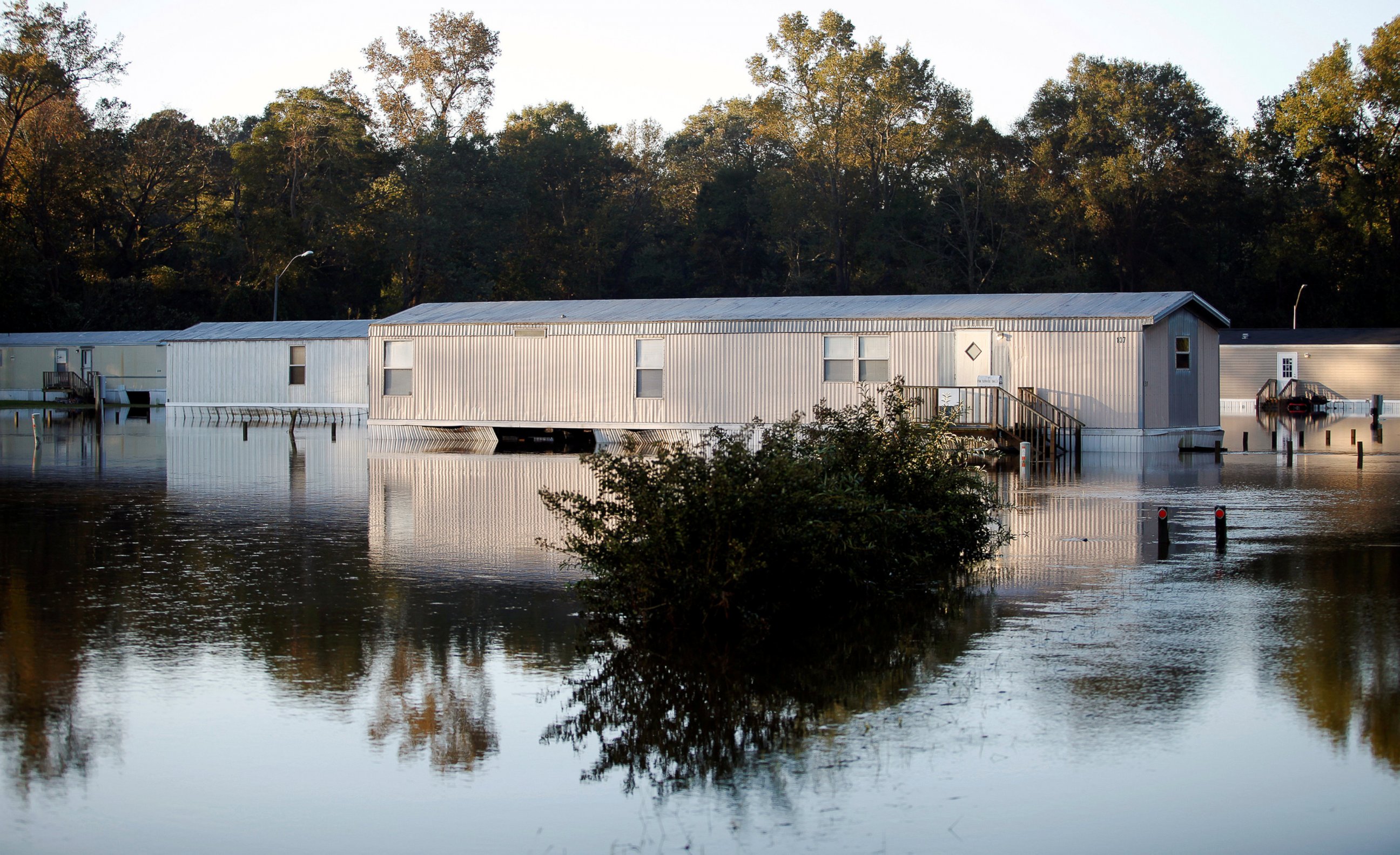 PHOTO: Mobile homes are reflected in the flood waters after Hurricane Matthew caused severe flooding in Goldsboro, North Carolina, Oct. 13, 2016. 