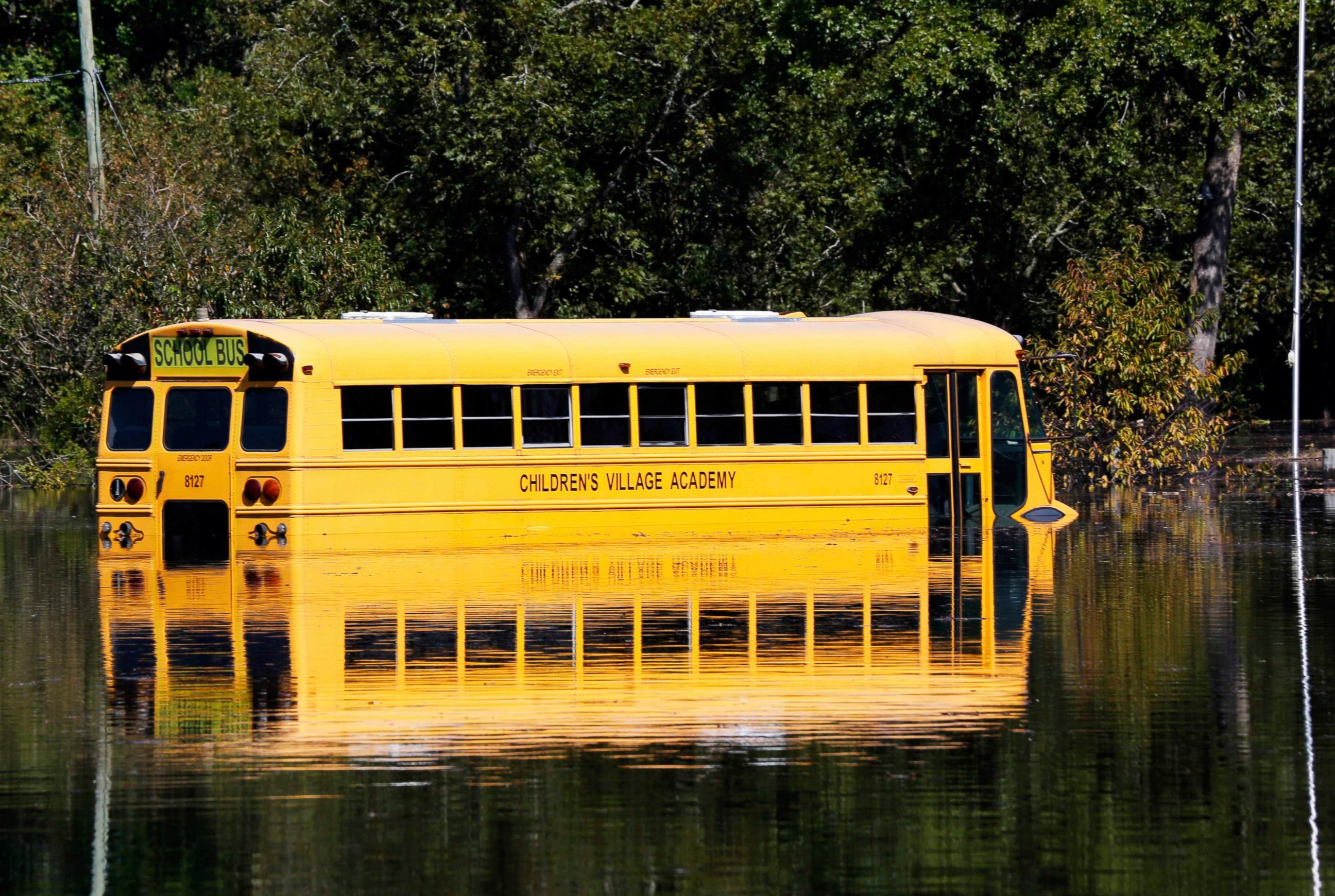 PHOTO: A school bus is pictured partially submerged as the Neuse River floods following Hurricane Matthew in Kinston, North Carolina, Oct. 12, 2016. 