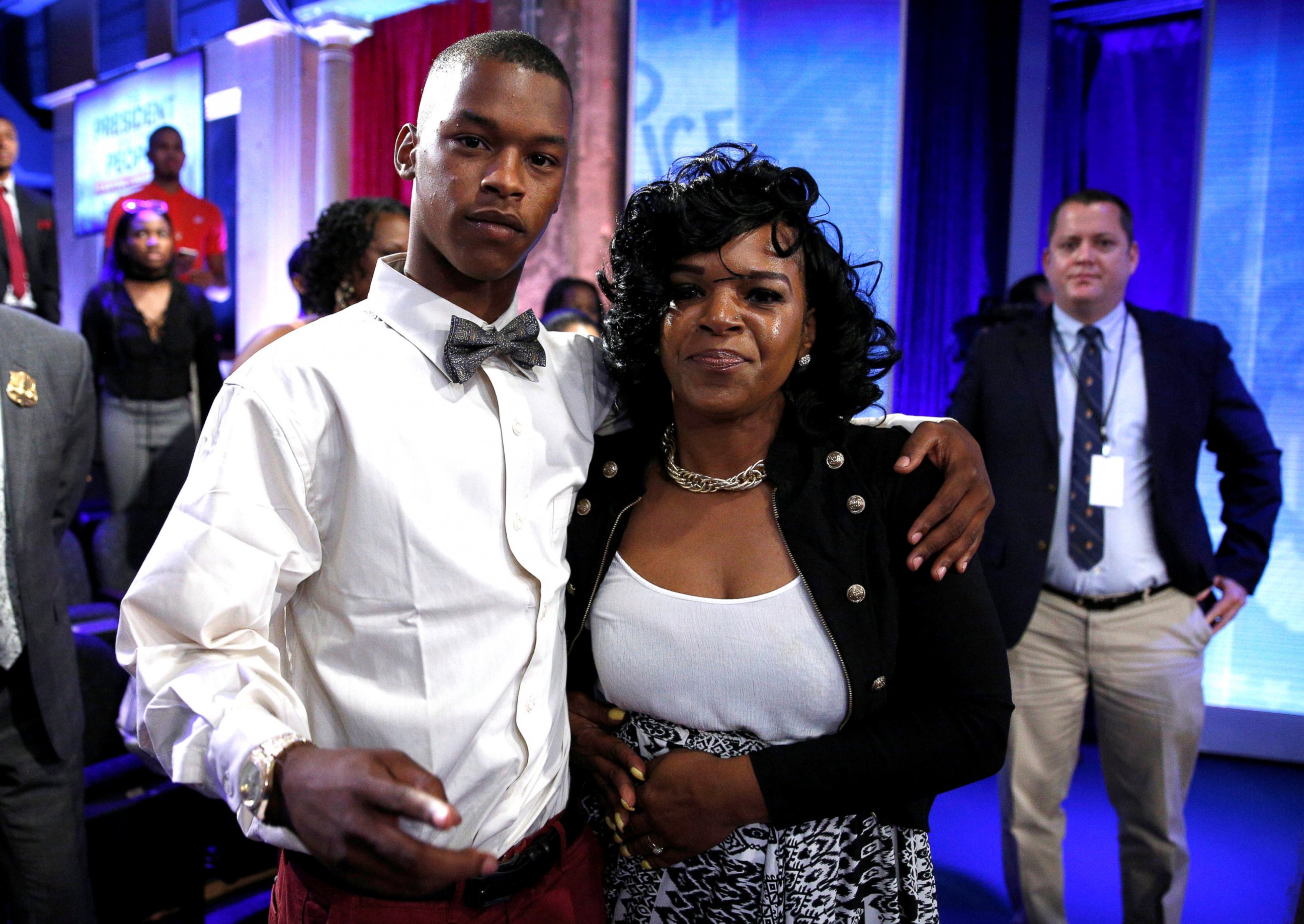 PHOTO: Baltimore mother Toya Graham who famously waded into a riot to retrieve her son Michael Singleton (L) stands with him after they joined U.S. President Barack Obama in a televised town hall in Washington, D.C., July 14, 2016. 