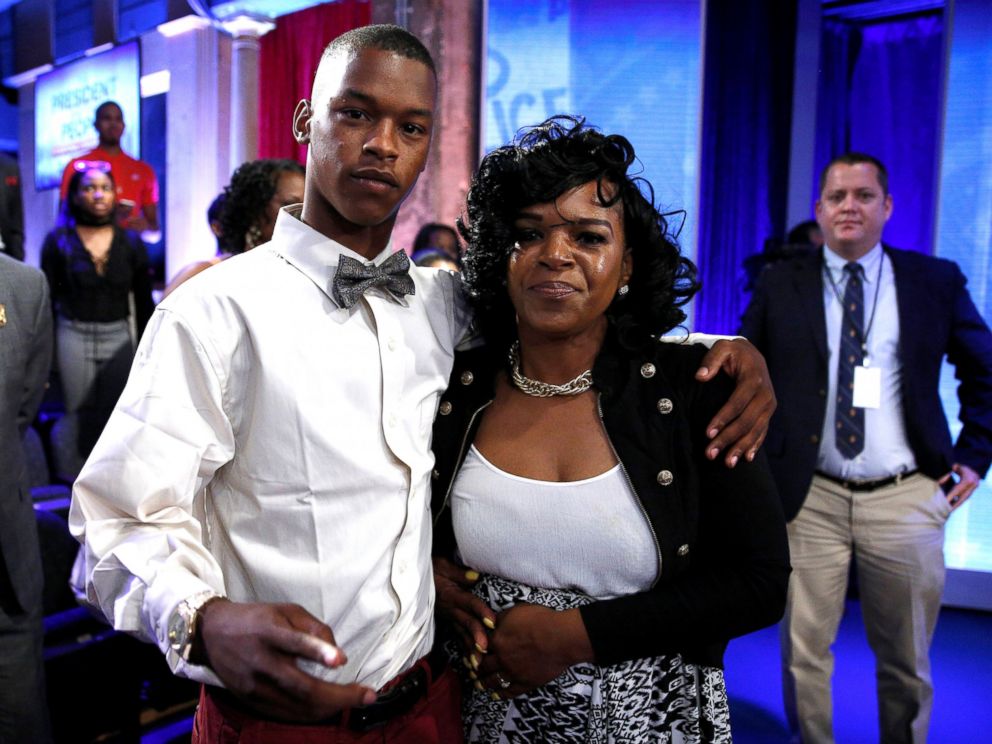 PHOTO: Baltimore mother Toya Graham who famously waded into a riot to retrieve her son Michael Singleton (L) stands with him after they joined U.S. President Barack Obama in a televised town hall in Washington, D.C., July 14, 2016.
