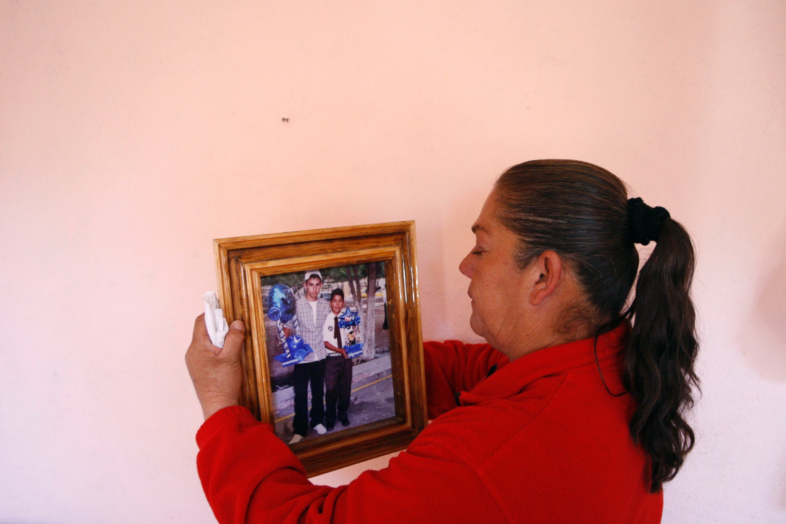 PHOTO: Maria Guadalupe Guereca, mother of the late Sergio Hernandez Guereca, holds a picture of her son at their home in Ciudad Juarez, Mexico, Jan. 18, 2011.