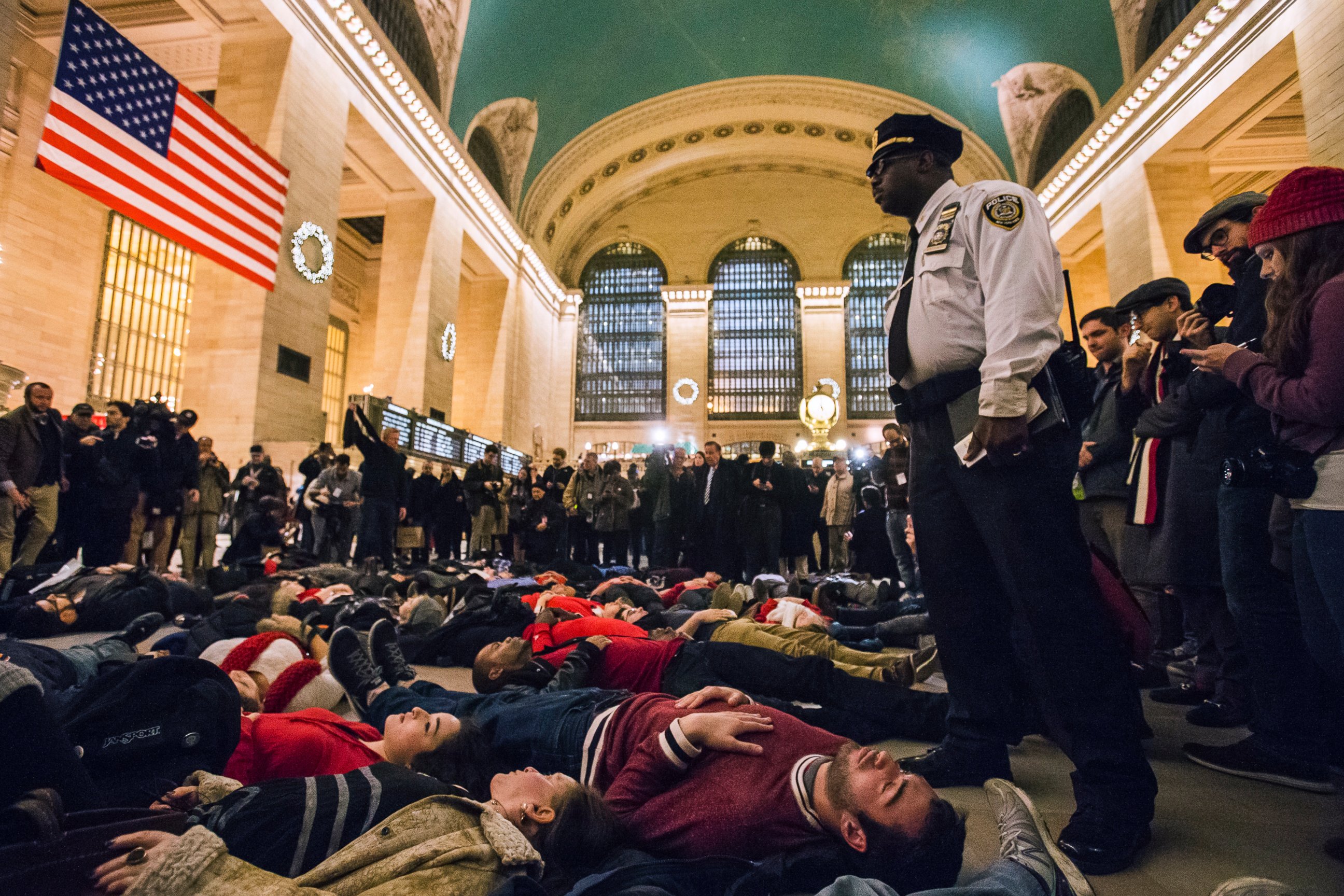 PHOTO: Activists demanding justice for the death of Eric Garner stage a 'die-in' during rush hour at Grand Central Terminal in the Manhattan borough of New York on Dec. 3, 2014.