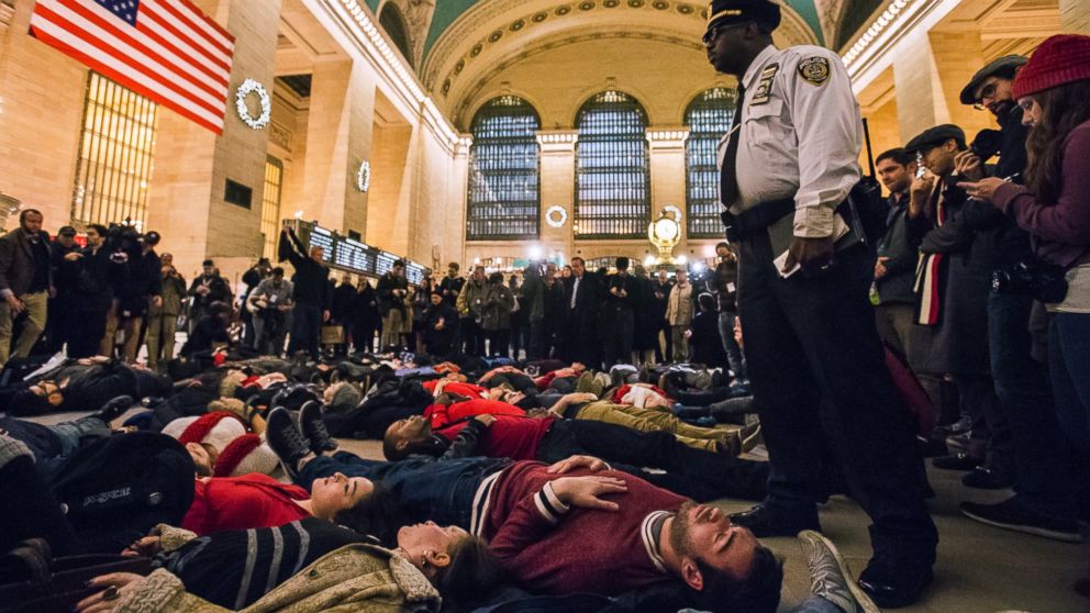 PHOTO: Activists demanding justice for the death of Eric Garner stage a 'die-in' during rush hour at Grand Central Terminal in the Manhattan borough of New York on Dec. 3, 2014.