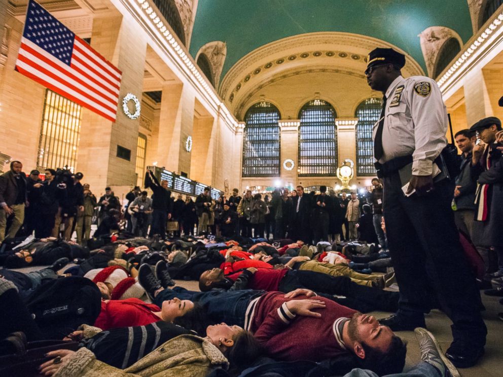 PHOTO: Activists demanding justice for the death of Eric Garner stage a die-in during rush hour at Grand Central Terminal in the Manhattan borough of New York on Dec. 3, 2014.