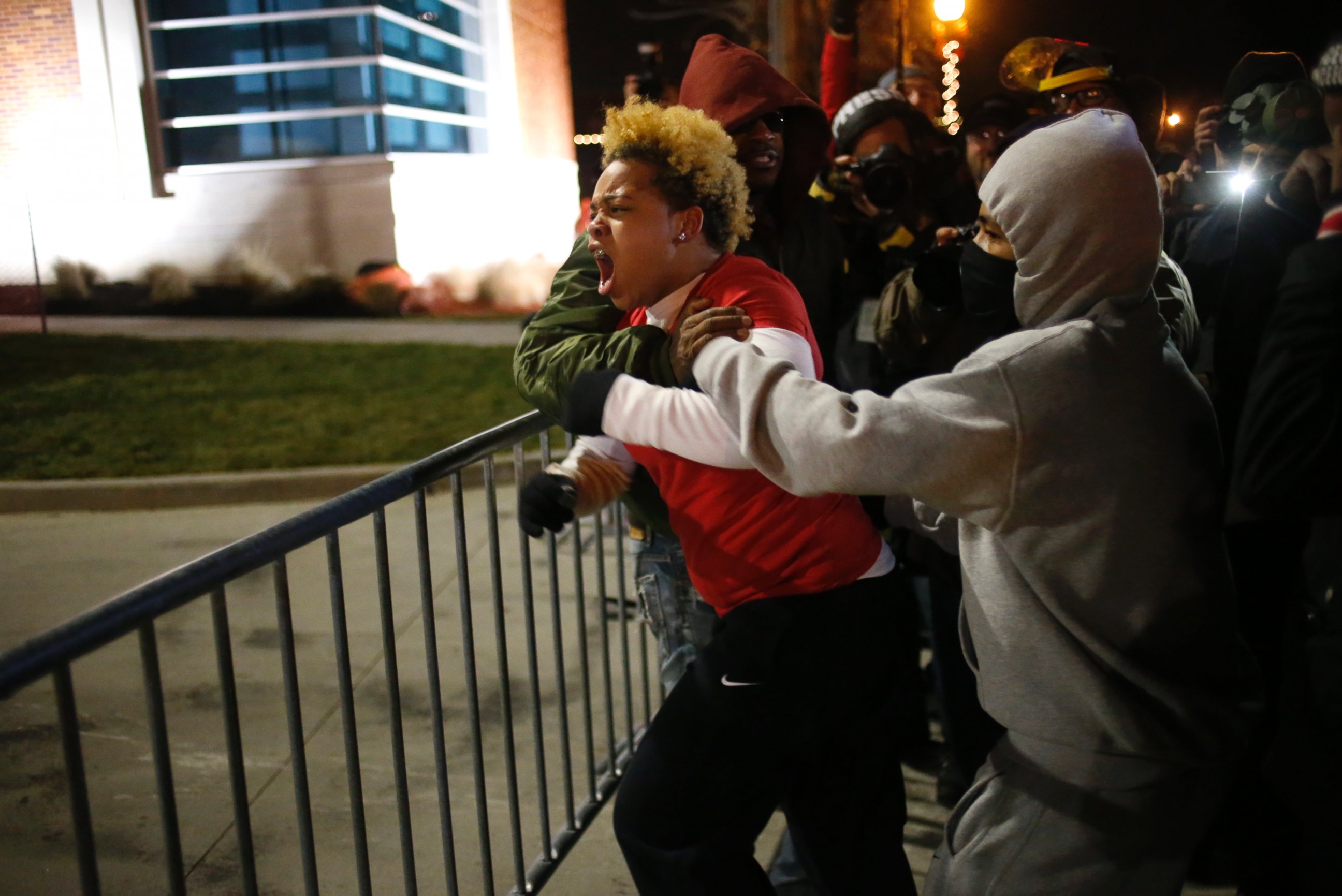 PHOTO: A woman approaches the barricade to confront the police outside the Ferguson Police Department in Ferguson, Mo. on Nov. 24, 2014.