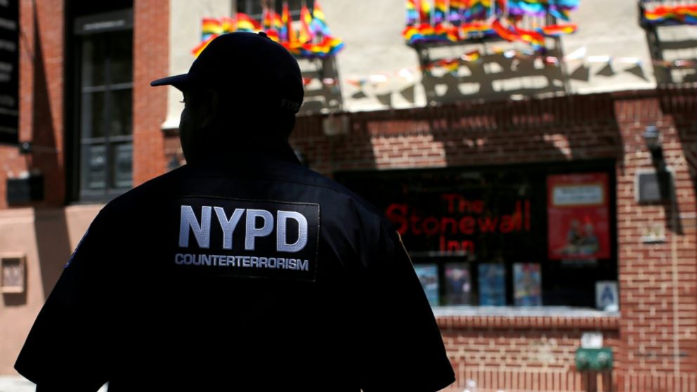 A member of the New York Police Department's Critical Response Command Unit stands guard by The Stonewall Inn on Christopher Street in New York following the shooting at Orlando's Pulse nightclub, June 12, 2016.