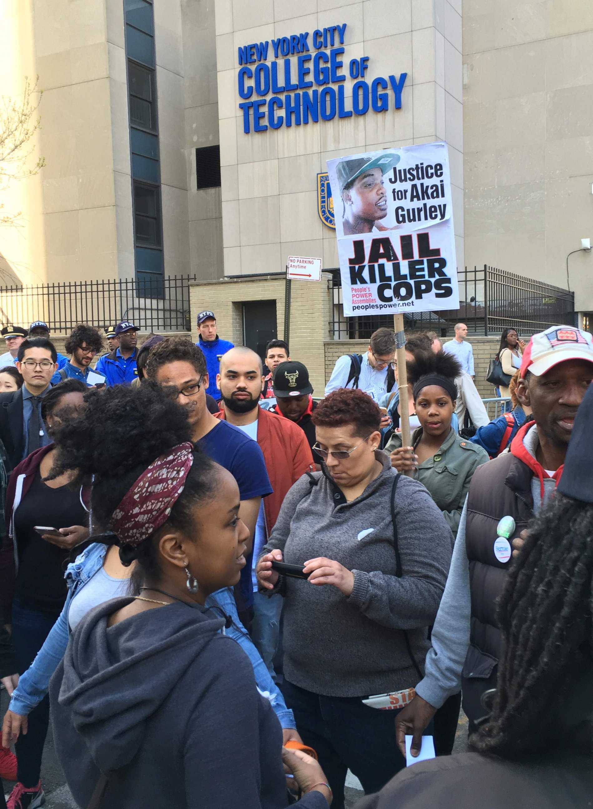 PHOTO: Activists protest against the sentence received by former New York Police Officer Peter Liang for manslaughter in the killing of Akai Gurley, outside a Brooklyn courthouse in New York, April 19, 2016.