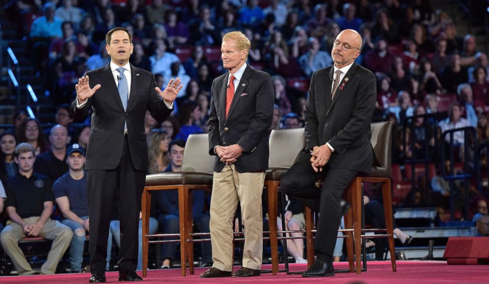 PHOTO: Sen. Marco Rubio, left, speaks during a CNN town hall meeting at the BB&T Center in Sunrise, Fla., Feb. 21, 2018. 