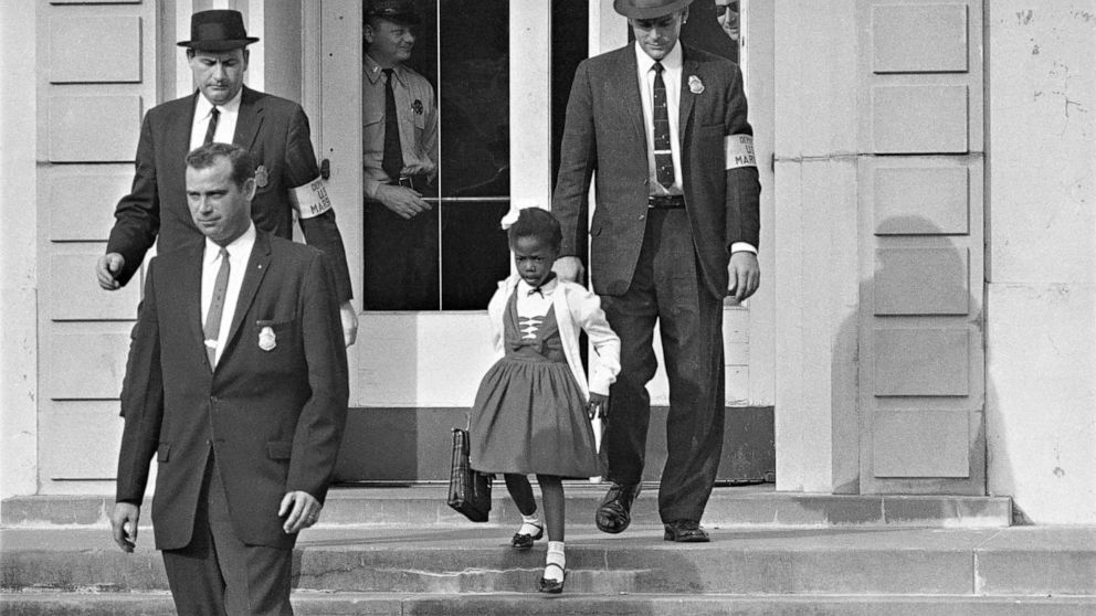 PHOTO: U.S. Deputy Marshals escort 6-year-old Ruby Bridges from William Frantz Elementary School in New Orleans, Nov. 1960.