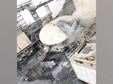 Aftermath of a chemical tank rupture at Nippon Dynawave Packaging in Longview, Washington, showing debris and damage.