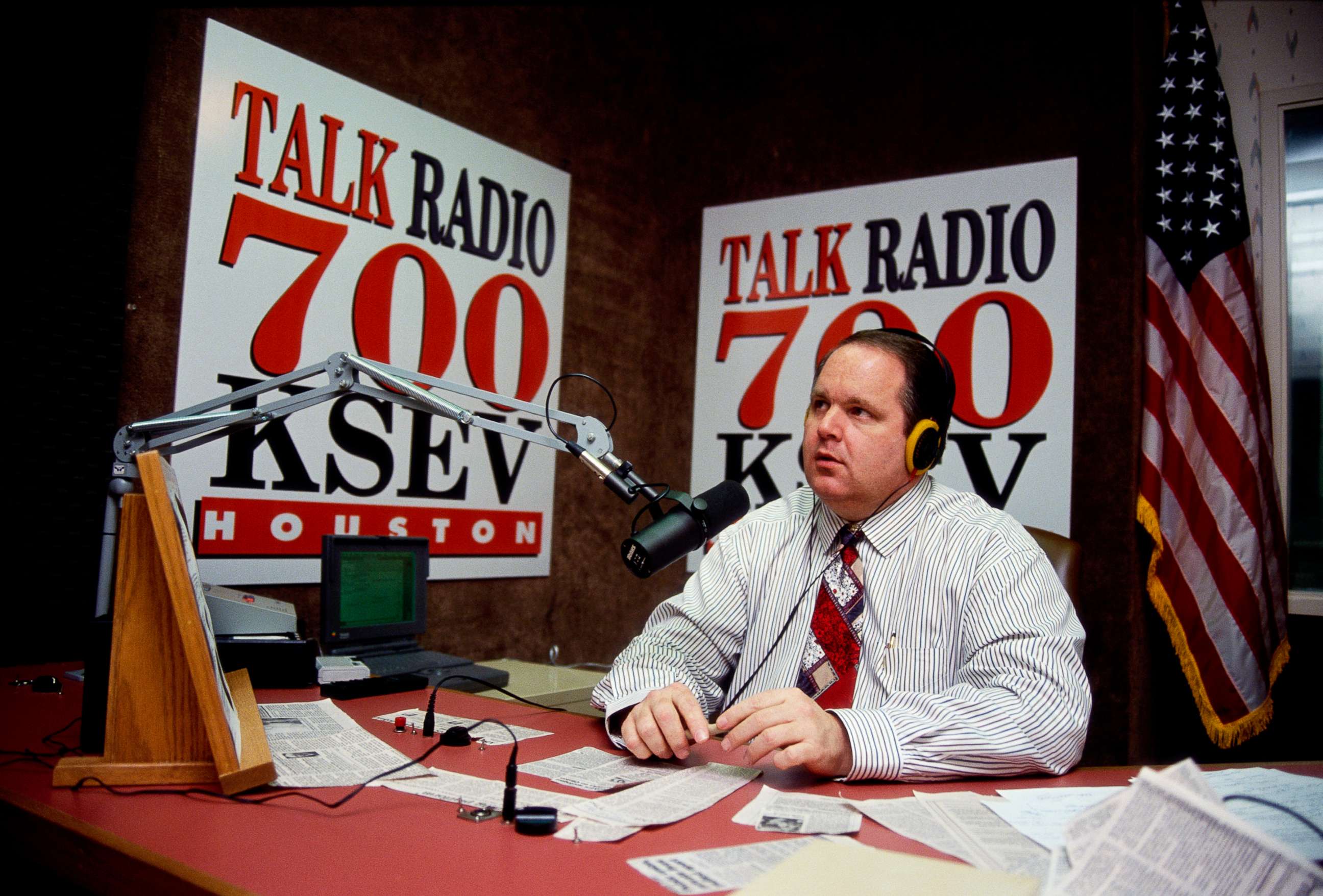 PHOTO: Conservative radio host Rush Limbaugh sits at his desk at Talk Radio 700 KSEV during the Republican National Convention in Houston.