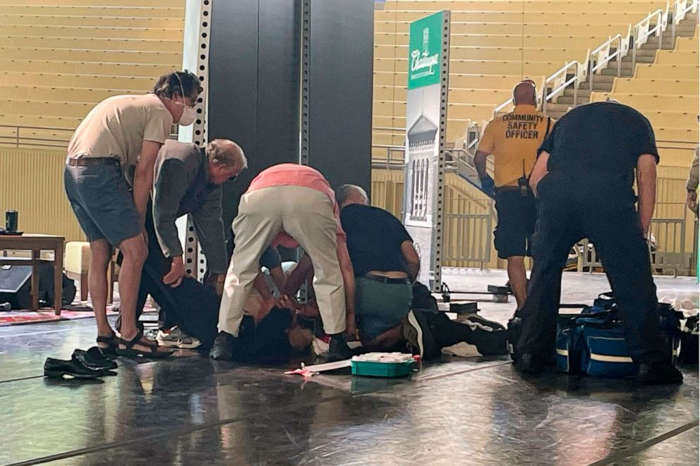 PHOTO: Author Salman Rushdie is tended to after he was attacked during a lecture, Aug. 12, 2022, at the Chautauqua Institution in Chautauqua, N.Y.