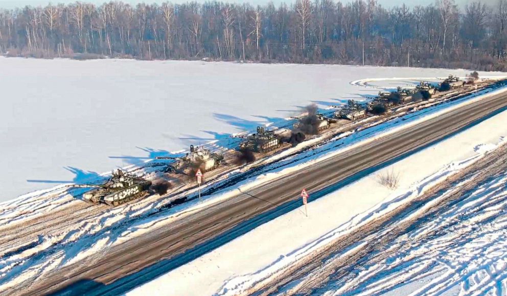 PHOTO: In this photo taken from video provided by the Russian Defense Ministry Press Service, Feb. 15, 2022, Russian army tanks move back to their permanent base after drills in Russia.