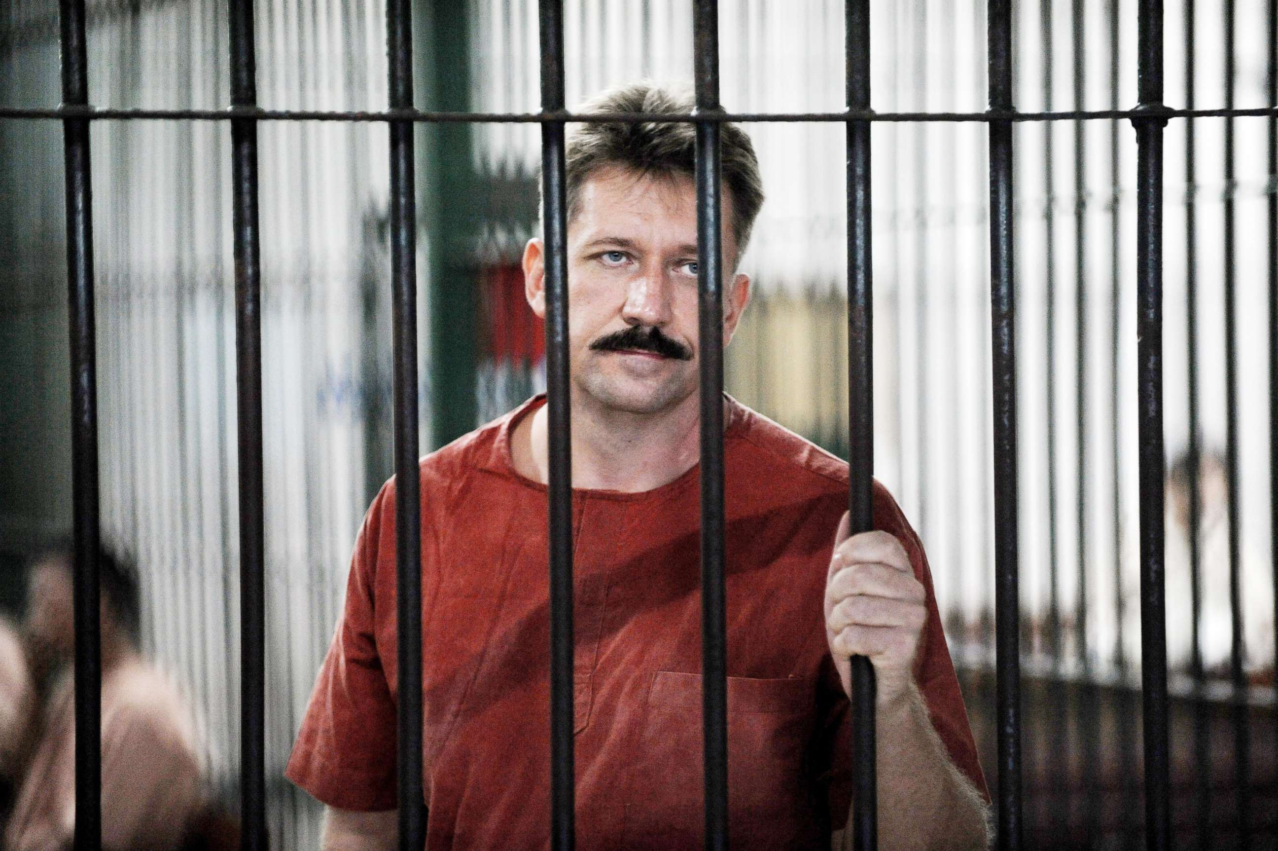 PHOTO: Viktor Bout looks from behind bars at the Criminal Court in Bangkok, Oct. 10, 2008.
