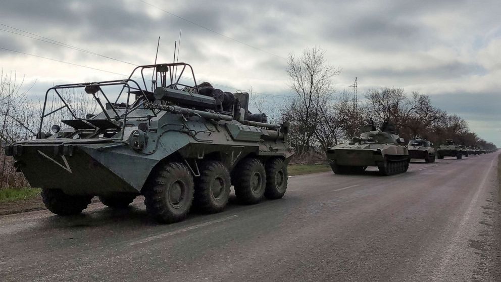 PHOTO: A Russian military convoy moves on a highway in an area controlled by Russian-backed separatist forces near Mariupol, Ukraine, April 16, 2022.