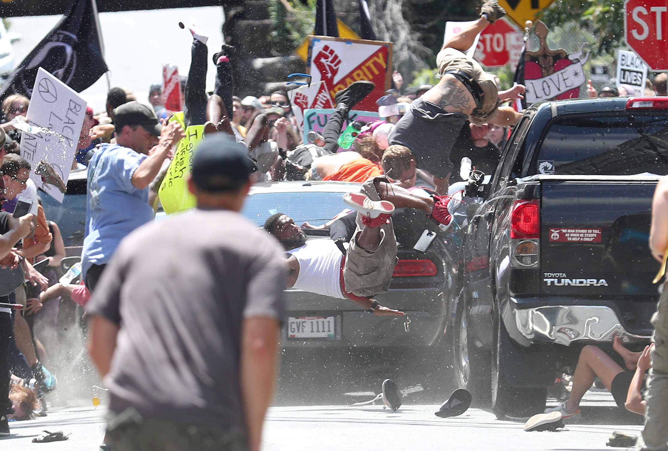 PHOTO: A vehicle plows into a group of protesters marching along 4th Street NE at the Downtown Mall in Charlottesville, Va., on the day of the Unite the Right rally, Aug. 12, 2017.