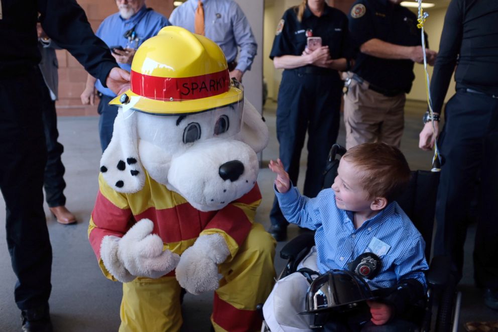 PHOTO: Sparky the dog greets Sutherland Springs shooting victim Ryland Ward outside University Hospital, Jan. 11, 2018.