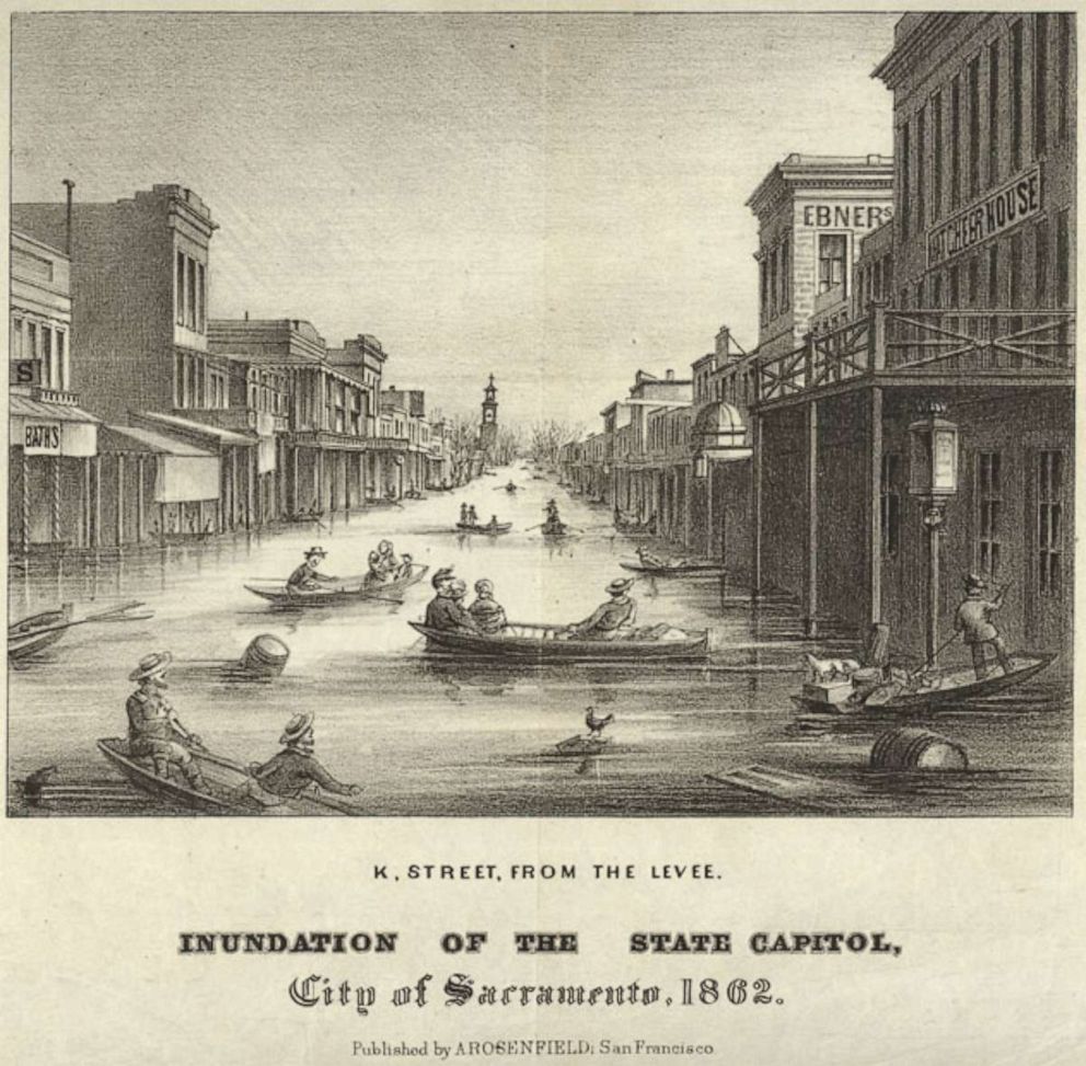 PHOTO: The inundation of the city of Sacramento during great flood of 1862 is depicted in an illustration, with  flotsam, row boats, and skiffs floating on a crowded flooded street.