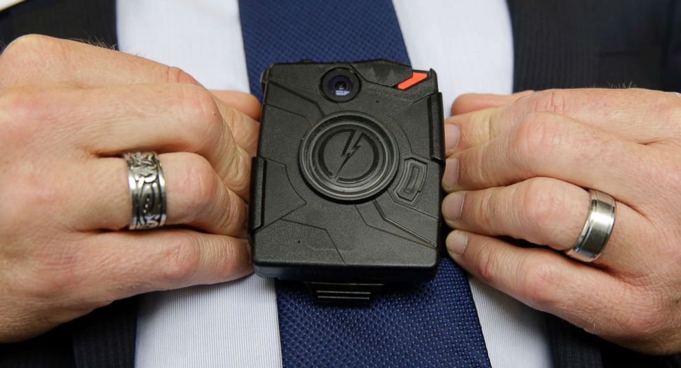 PHOTO: Steve Tuttle, vice president of communications for Taser International, demonstrates one of the company's body cameras during a company-sponsored conference at the California Highway Patrol Headquarters in Sacramento, Calif., Feb. 19, 2015.