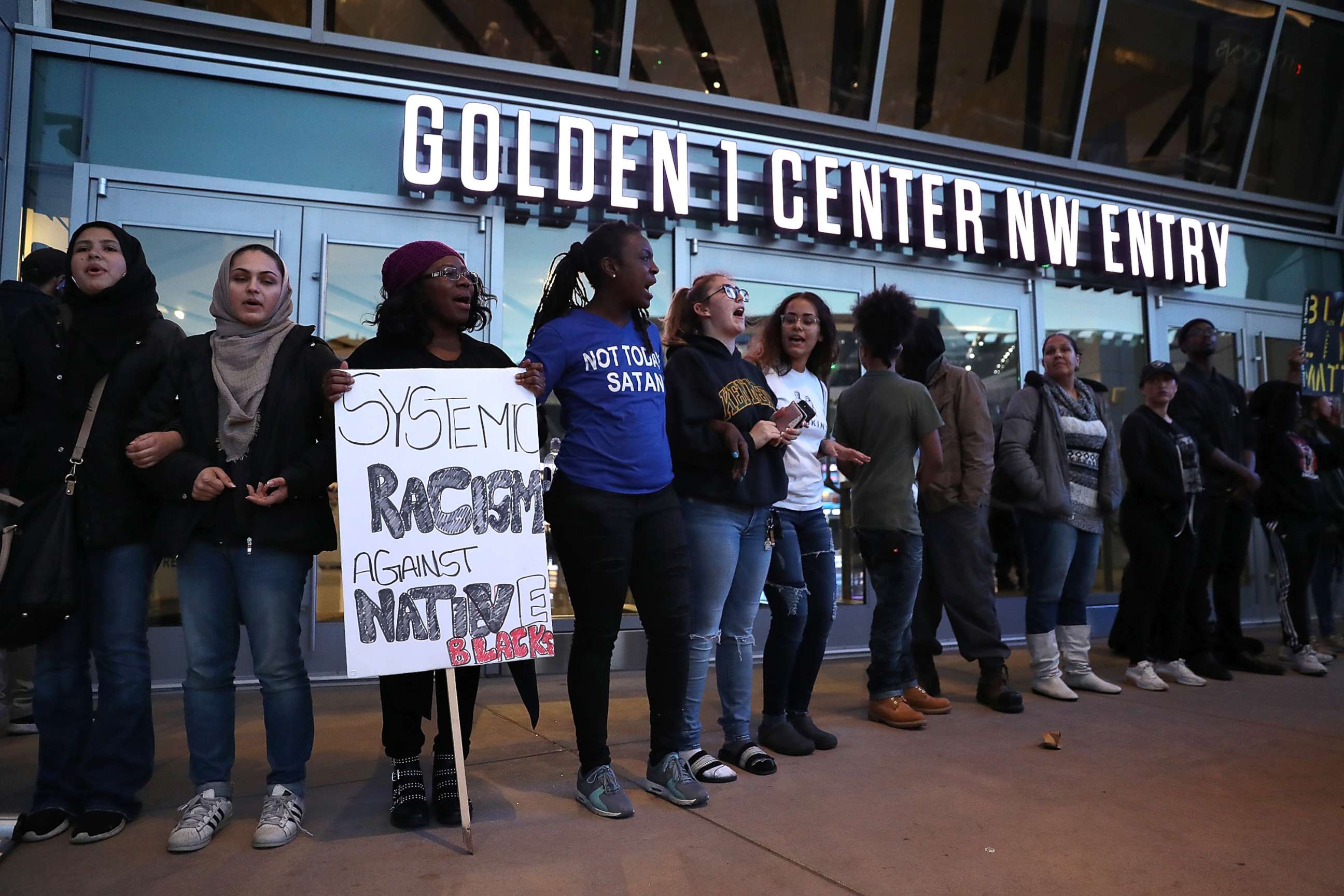 PHOTO: Black Live Matter protesters chant as they block the entrance to the Golden 1 Center during a demonstration on March 22, 2018 in Sacramento, Calif. 