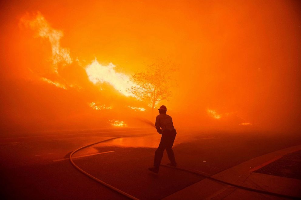 PHOTO: ANF Texas Canyon Station Firefighters battle the flames of the Saddlebridge Fire in Sylmar, Calif. on Oct. 10, 2019.