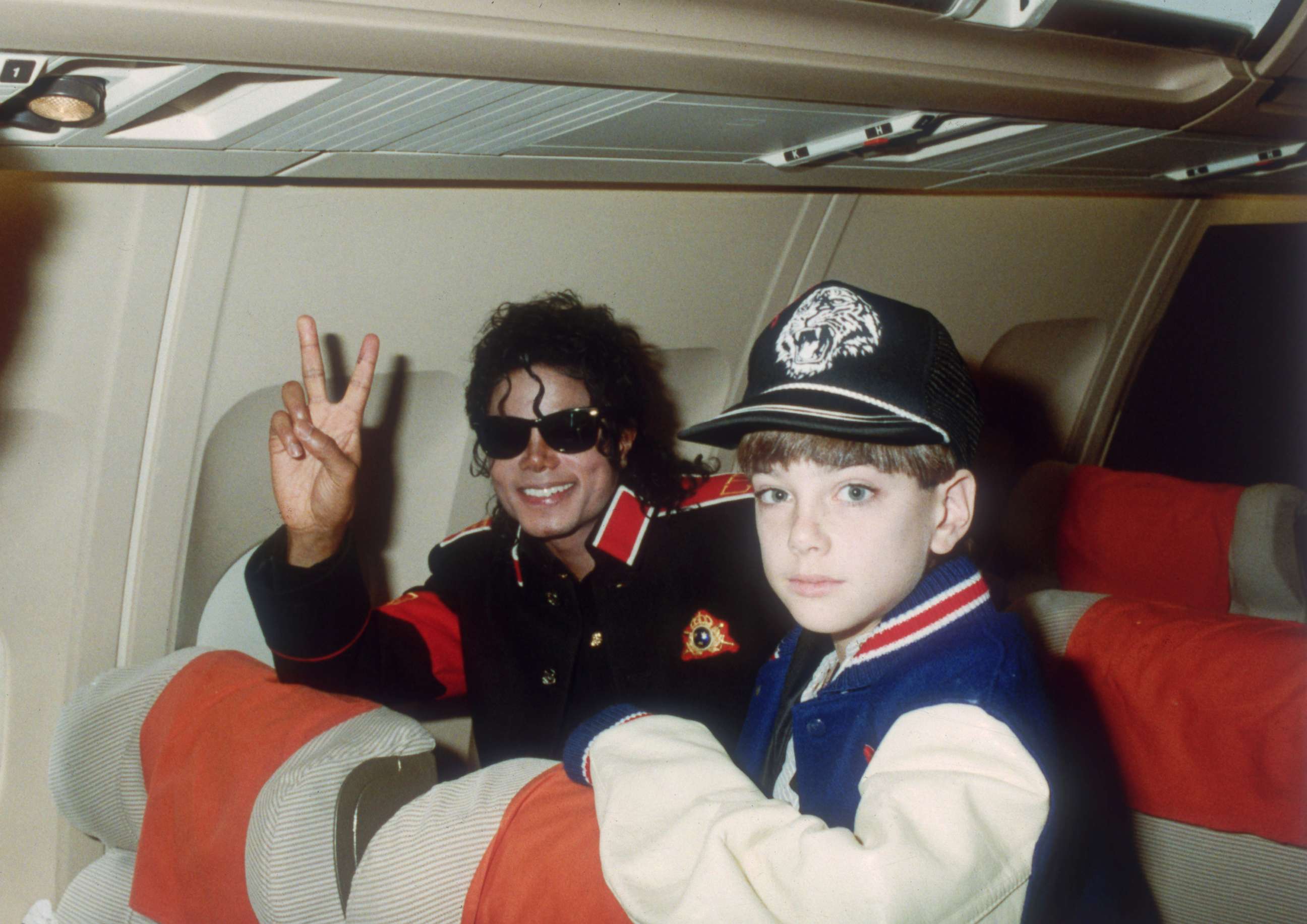 PHOTO: Michael Jackson with 10 year old Jimmy Safechuck on a tour plane on July 11, 1988.