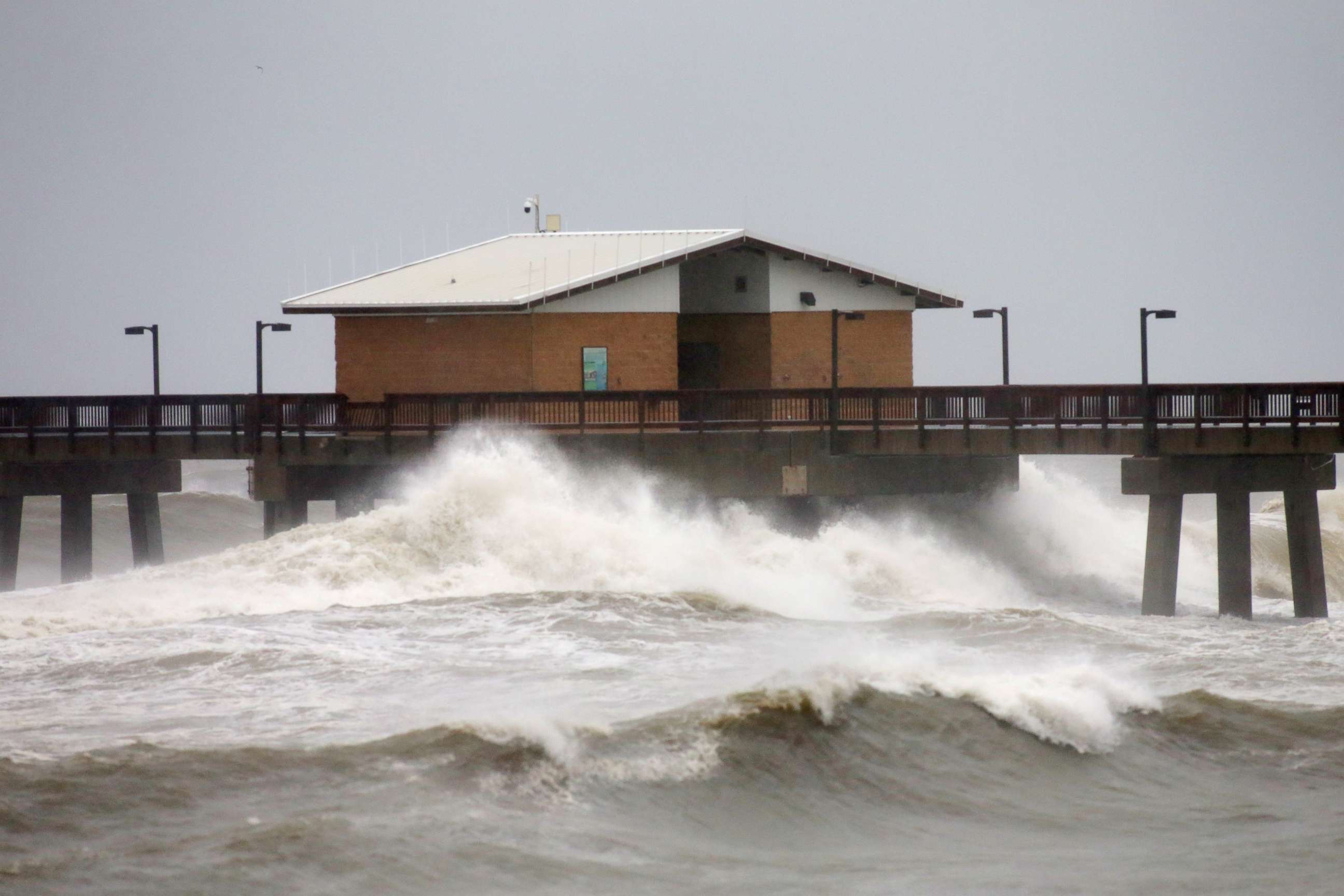 PHOTO: Waves crash along a pier as Hurricane Sally approaches in Gulf Shores, Ala., Sept. 15, 2020.