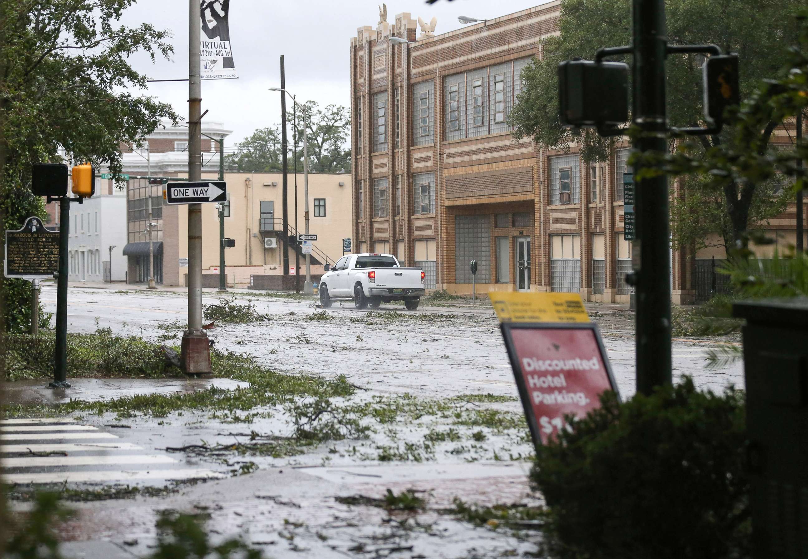 PHOTO:A car drives down Government Street during Hurricane Sally in Mobile, Ala., Sept. 16, 2020.