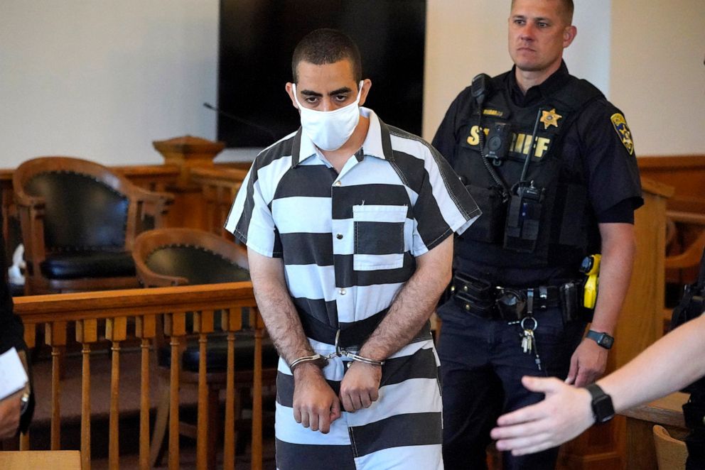 PHOTO: Hadi Matar, 24, center, arrives for an arraignment in the Chautauqua County Courthouse in Mayville, N.Y., Aug. 13, 2022.  