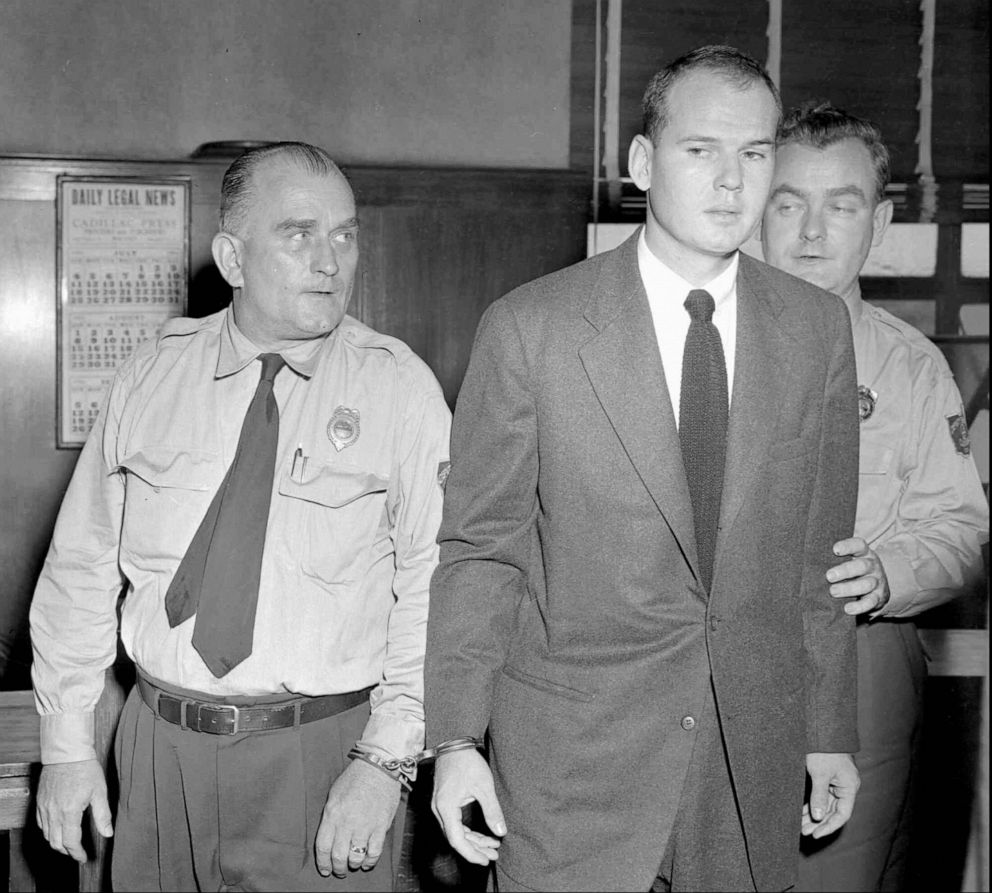 PHOTO: Dr. Sam Sheppard, accompanied by law officers, returns to his jail cell in Cleveland on Dec. 21, 1954, after a jury found the 30-year-old osteopath guilty of killing his wife.