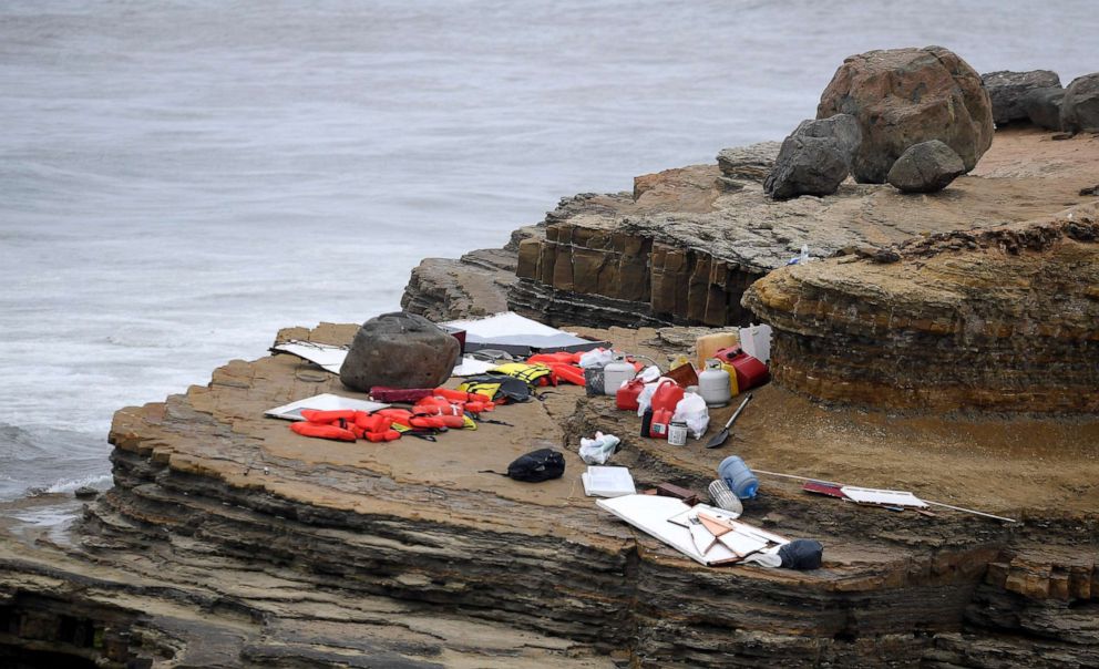 PHOTO: Items from a boat sit on the shoreline at Cabrillo National Monument near where it capsized just off the San Diego coast, May 2, 2021, in San Diego.