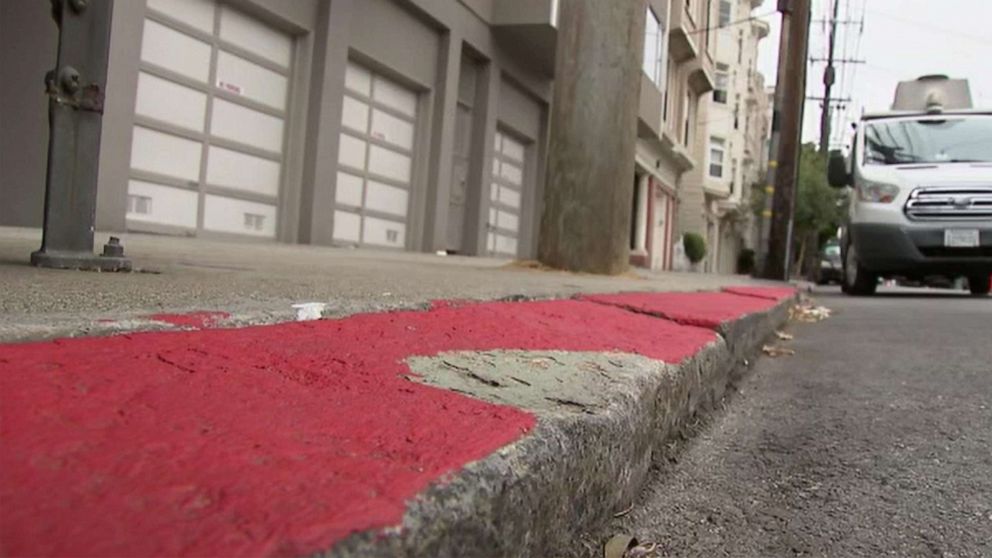 PHOTO: A bare spot remains on the curb where Jeff and Desiree Jolly were parked when they received a ticket after curb was repainted while their car was parked in San Francisco, July 26, 2022. 