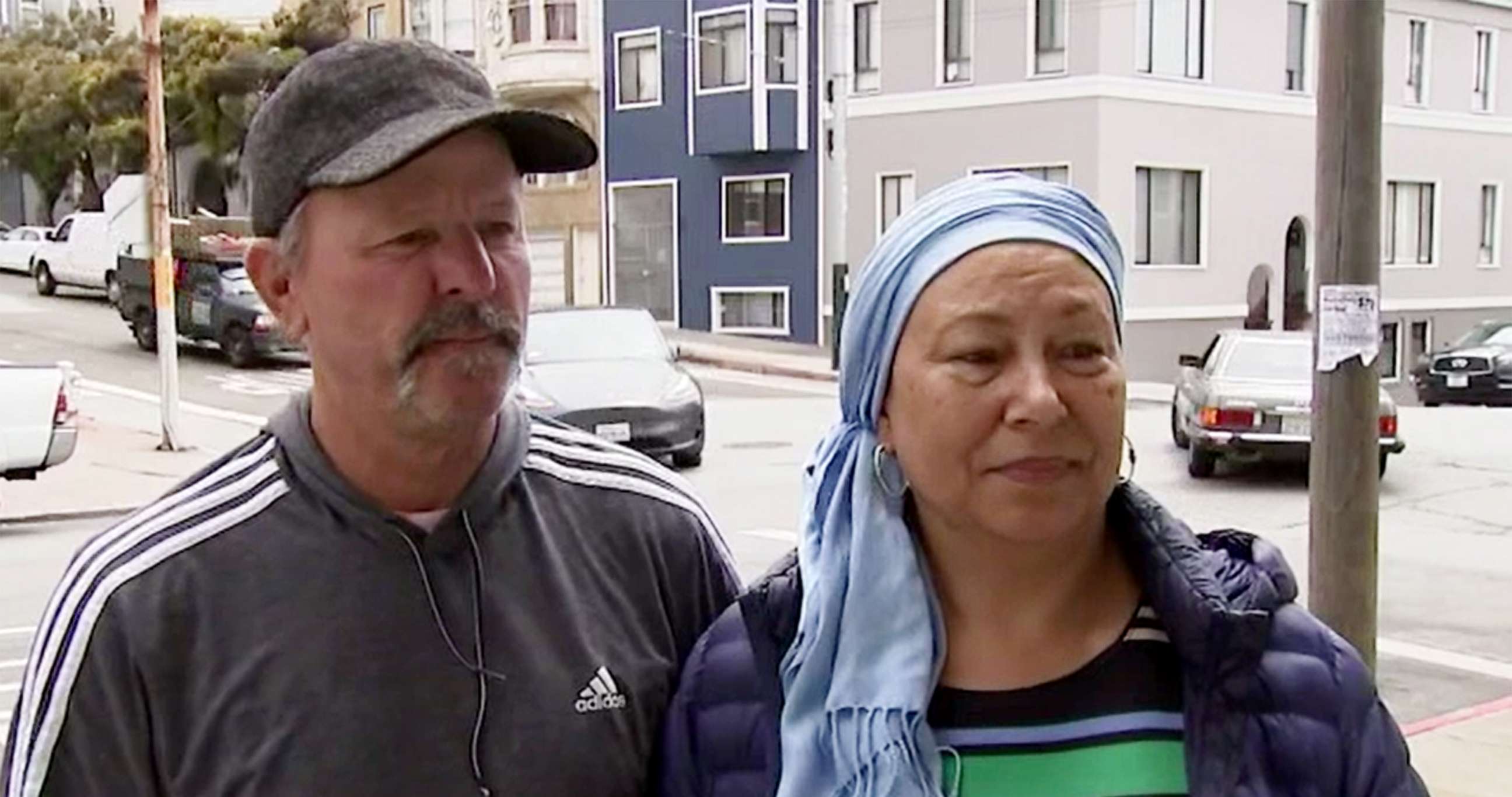 PHOTO: Jeff and Desiree Jolly are interviewed about receiving a parking ticket after curb was repainted while their car was parked in San Francisco, July 26, 2022.