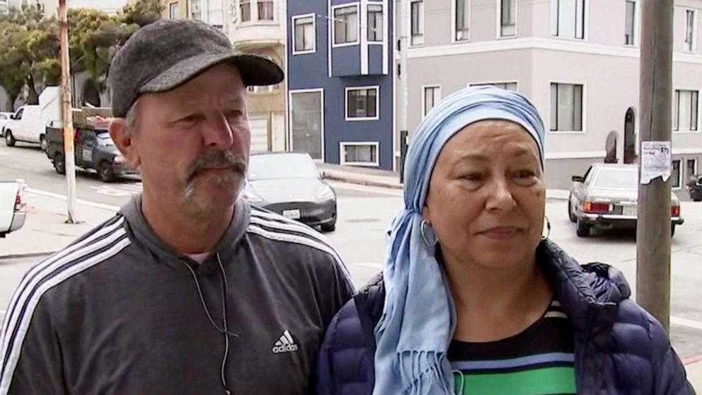 PHOTO: Jeff and Desiree Jolly are interviewed about receiving a parking ticket after curb was repainted while their car was parked in San Francisco, July 26, 2022.