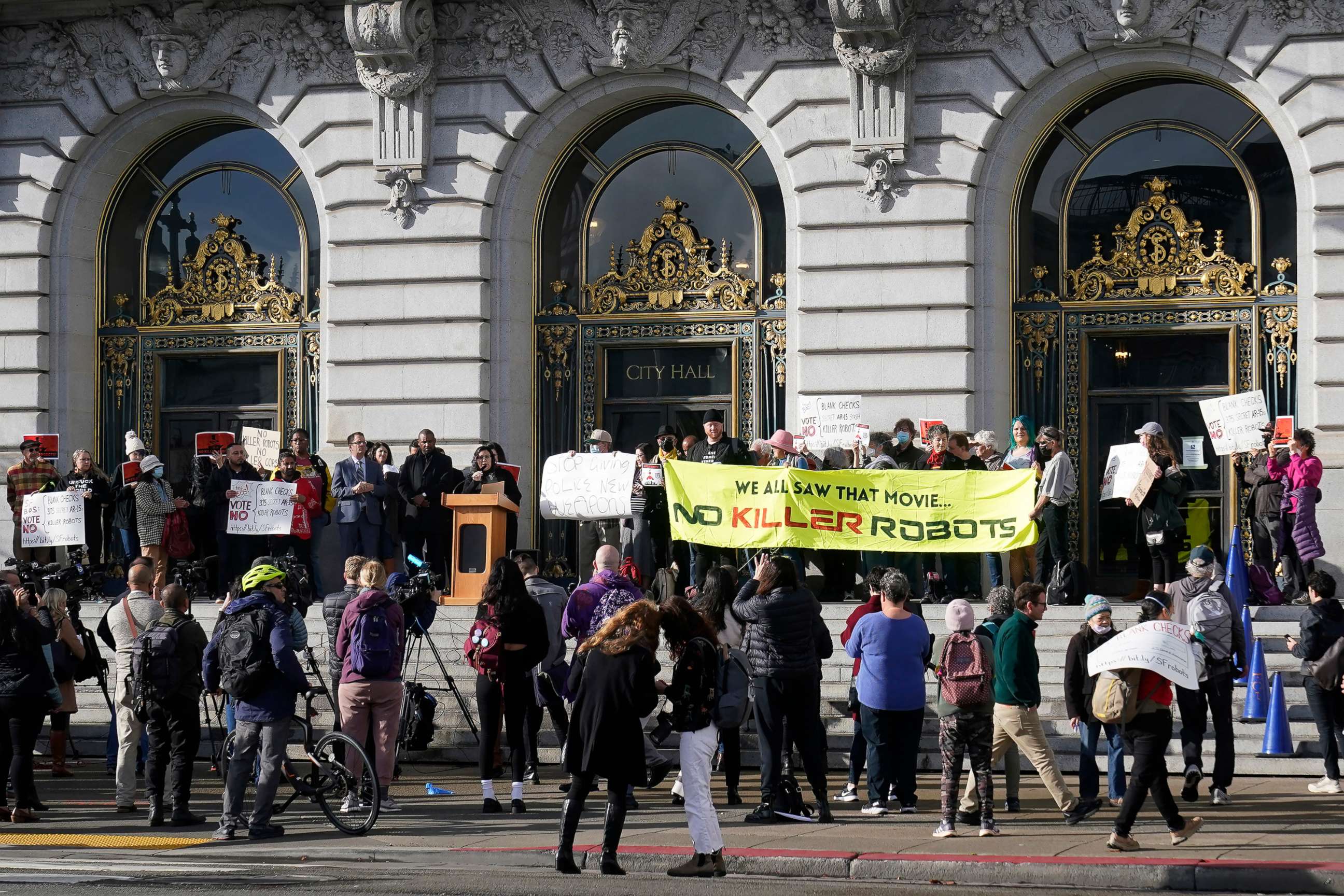 PHOTO: People take part in a demonstration about the use of robots by the San Francisco Police Department outside of City Hall in San Francisco, on Dec. 5, 2022.