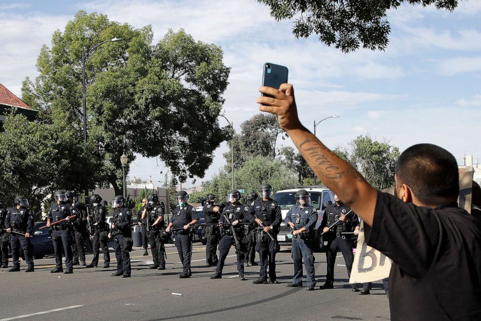 PHOTO: San Jose police form a line as they prepare to advance on protesters in San Jose, California, on May 29, 2020.