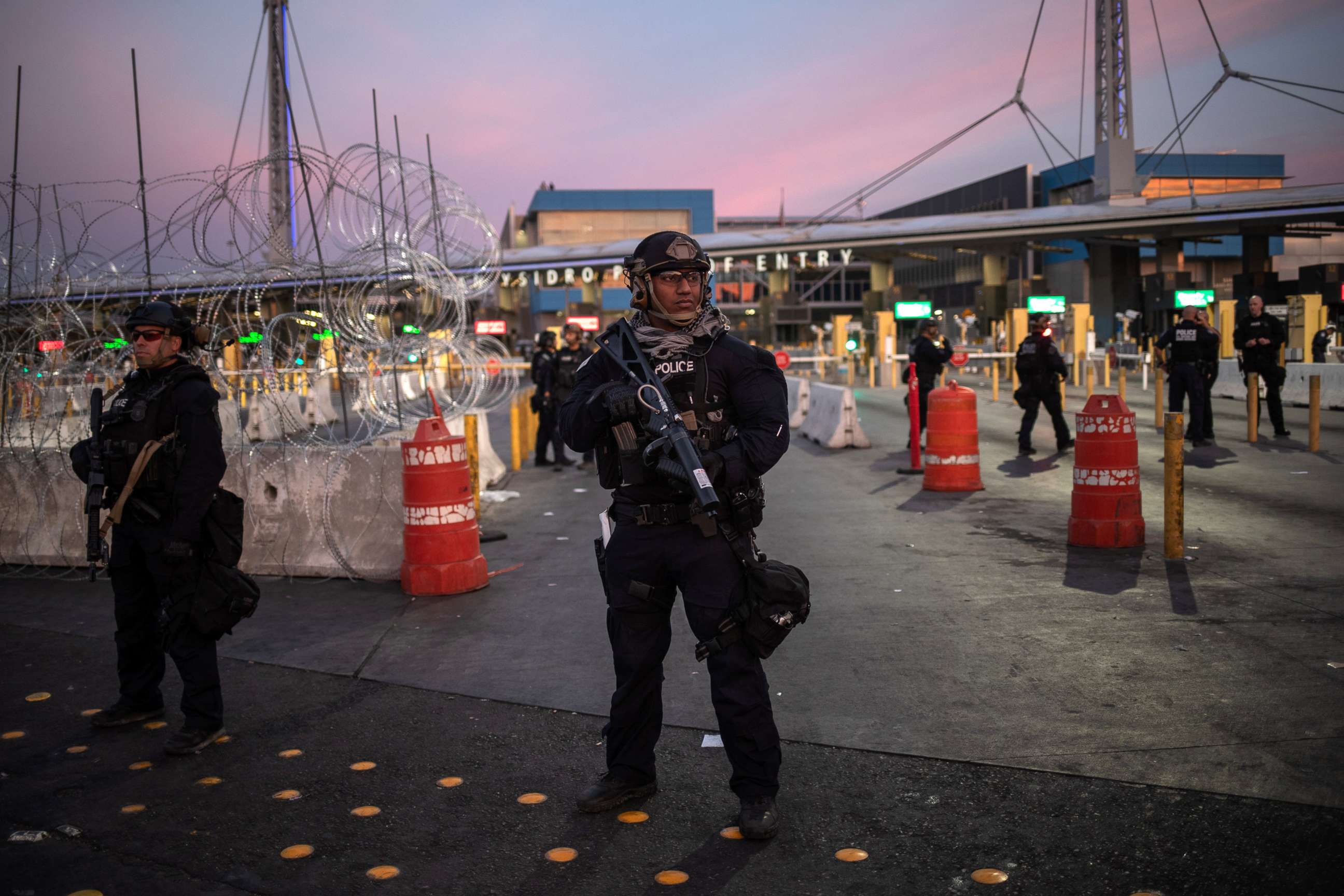 PHOTO: U.S. Customs and Border Protection Special Response Team officers stand guard at the San Ysidro Port of Entry after the land border crossing was temporarily closed to traffic from Tijuana, Mexico, Nov. 19, 2018.